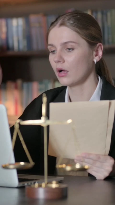 Tense FeLawyer Feeling Upset while Reading Legal Documents at Work, vertical Stock Footage 326258019