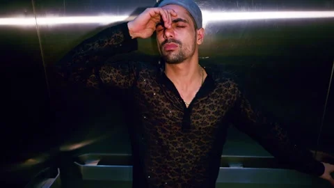 Tense Guy inside lift trapped by mental crisis Stock Footage 302072750