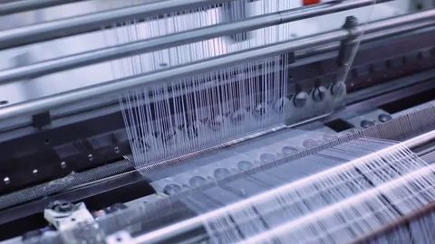 Tense hand woven on a workbench in the shop. Stock Footage