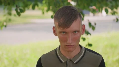 Tense Roadside Observer, Suspicious Figure Watching Highway Traffic Carefully Stock-Footage 327153783