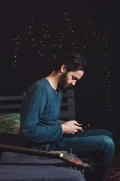 Tensed man using mobile phone Stock Photos
