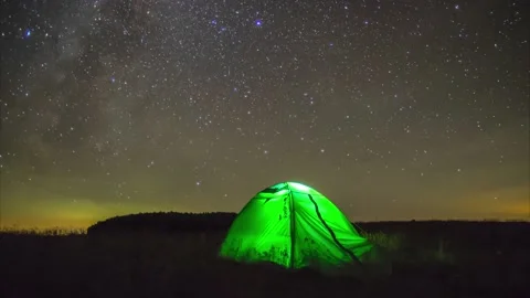 Tent on the background of the starry sky in the mountains 库存影片 144792738