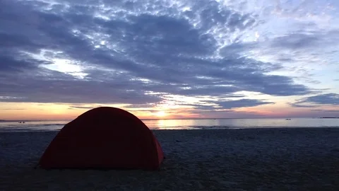 Tent on the beach dusk to night time lapse shot Stock Footage 83372162