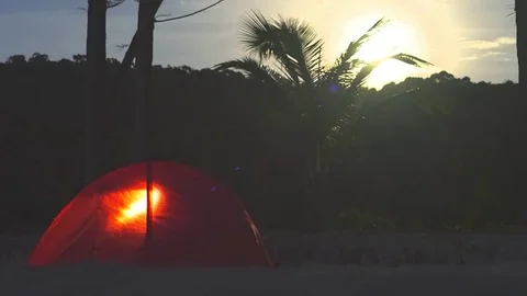 Tent on the beach under moonlight time lapse shot Stock Footage 83373453