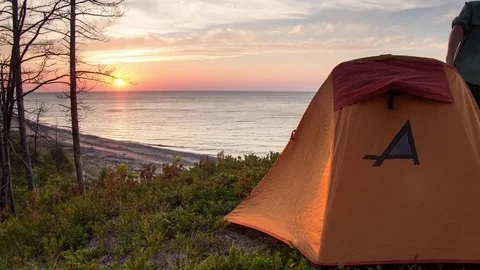 Tent on a bluff while sunsets Stock Footage 72898647