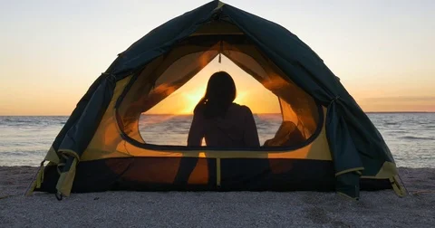 Tent camping by the sea Stock Footage 83575316