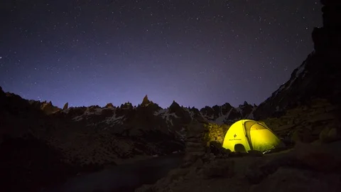 Tent in mountain during night and sunrise Stock Footage 75014698