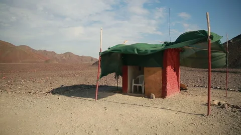 Tent on a sand at the windy evening Stock Footage 64872833