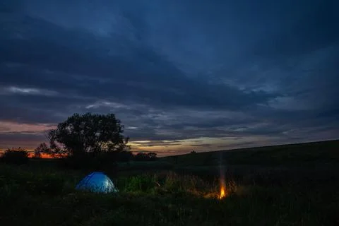 Tent at sunset in the wild Stock Photos