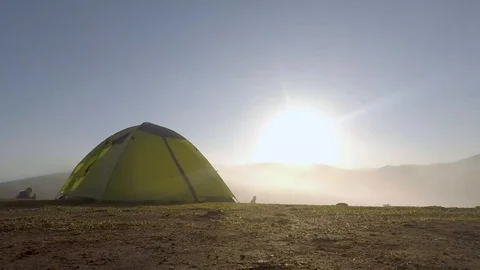 Tent timelapse sun and overlooking clouds Stock Footage 119085381