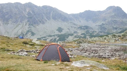 Tent on the top of the mountain Stock Footage 79749810