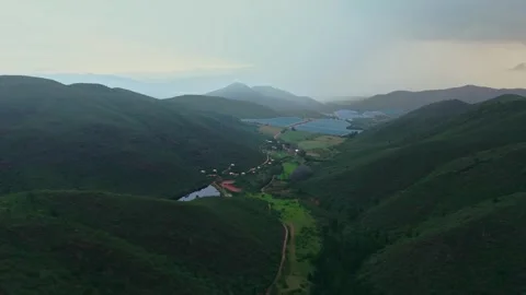 Tented eco-camp and irrigation reservoirs, cinematic aerial, Western Cape Stock Footage 342353934