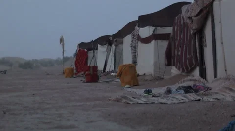 Tents in the desert during a sand storm Stock Footage 38213835