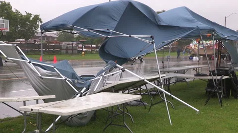 Tents destroyed by wind storm at event Stock Footage 51715054