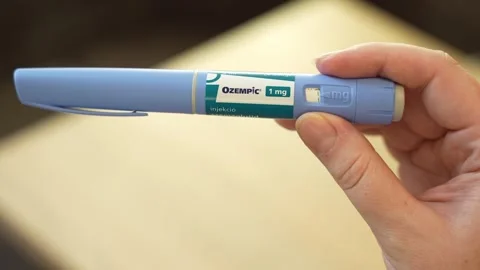 Teplice, Czech Republic - May 20, 2025: Ozempic injection pen held in hand for Stock Footage 319474667