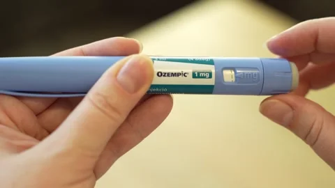 Teplice, Czech Republic - May 20, 2025: Ozempic injection pen held by hand for Stock Footage 319474975