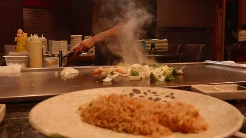 Teppanyaki Chef Making a Onion Volcano Fire Stock Footage 100085706