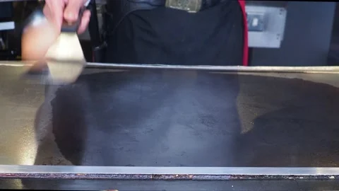 Teppanyaki Chef, Preforming Tricks With An Egg, At A Restaurant, London, UK 動画素材 154349563