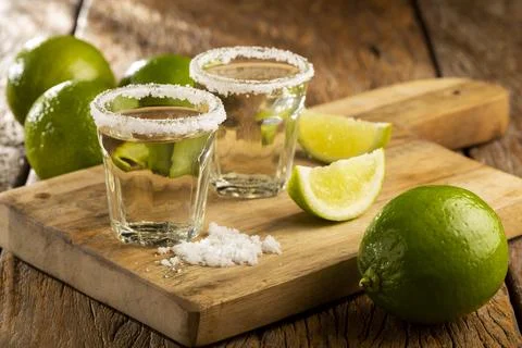 Tequila with lime and salt. Stock Photos