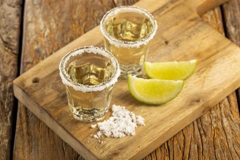 Tequila with lime and salt. Stock Photos