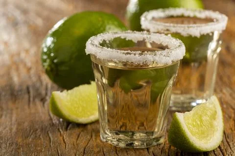 Tequila with lime and salt. Stock Photos
