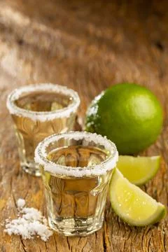 Tequila with lime and salt. Stock Photos