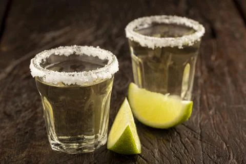 Tequila with lime and salt. Stock Photos