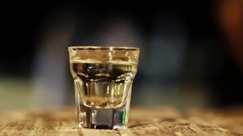 Tequila Shot with Blurred Background Stock Footage 93435130
