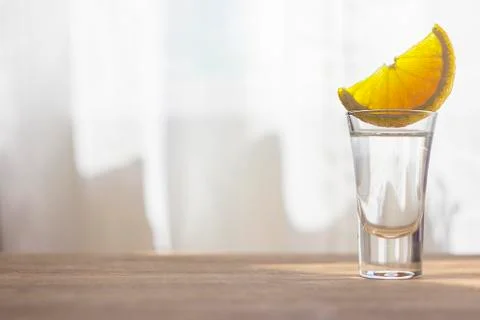 Tequila shot with orange Stock Photos