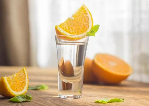 Tequila shot with orange Stock Photos