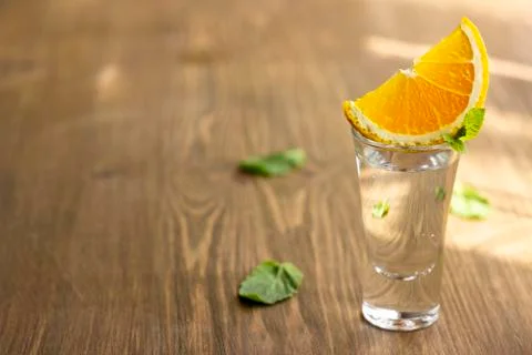 Tequila shot with orange Stock Photos