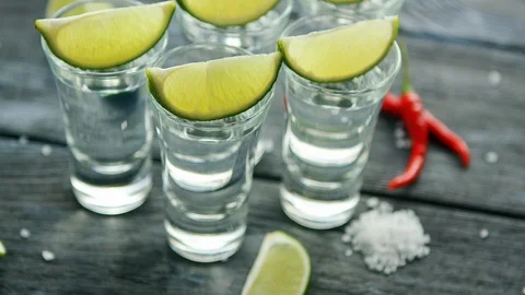 Tequila shots served on table Stock Footage 95008938