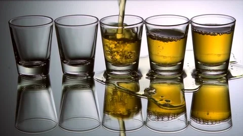 Tequila shots . Slow motion 4k Stock Footage 89651562