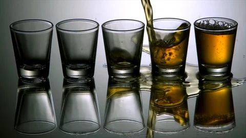 Tequila shots. Slow motion 4k Stock Footage 89651597