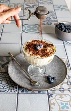 Teramisu on a plate on the kitchen table Foto stock