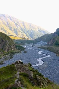 The Terek River flows through the Daryal Gorge. Stock Photos