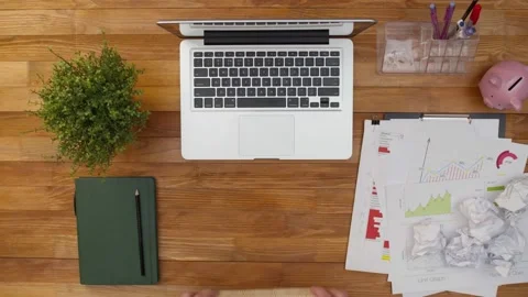 Term of example from wooden cubes made on the table next to a laptop and office Stock Footage 155002901