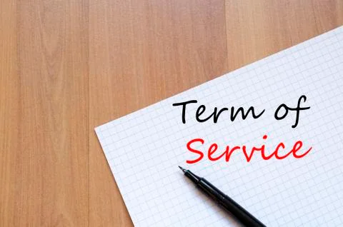 Term of service write on notebook Stock Photos