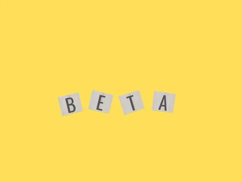 The term "wooden block with text BETA" describes how an asset's risk is mea.. Foto stock