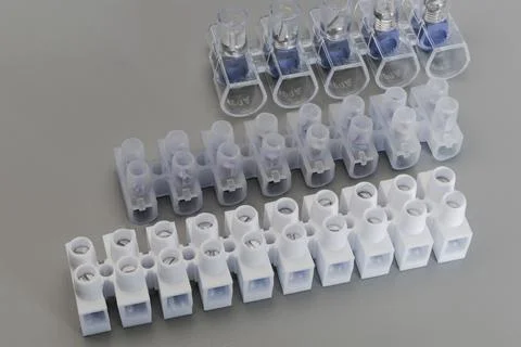 Terminal blocks and distribution blocks. Connecting electrical cables of diff Photos