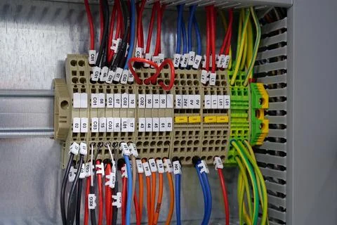 Terminal blocks in electrical cabinet. Cable connector. Industrial electrical Фото