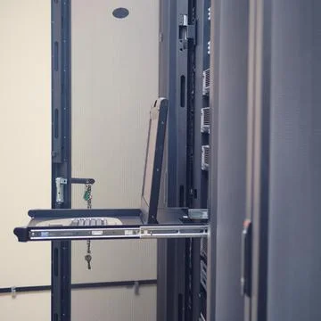 The terminal keyboard in the server room allows for easy access to critical d Stock Photos