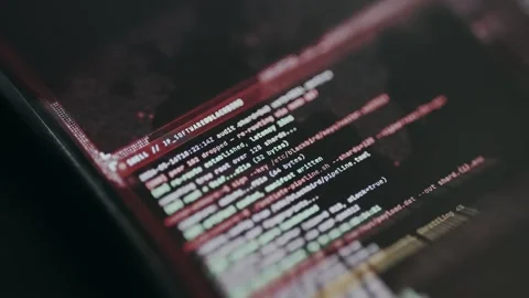 Terminal screen displaying computer code and system logs, Hacker activity Stock-Footage 335449323