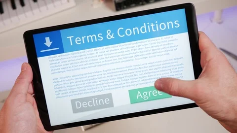 Terms and Conditions Being Accepted on a Tablet Stock Footage 125089536