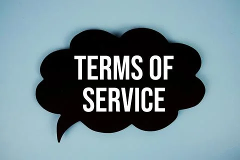 Terms of Service text with speech bubble top view on blue background Stock Photos