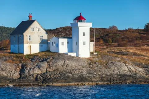 Terningen Lighthouse. White tower with red top. Norway Stock Photos