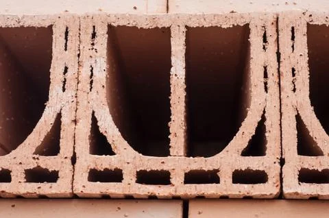 Terra cotta bricks pile in construction site Stock Photos
