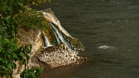 Terraba river with small waterfall Stock Footage 126615919