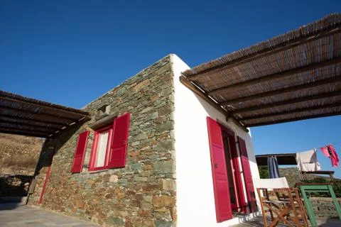 Terrace and close-up from a typical facade at Folegandros. Stock Photos