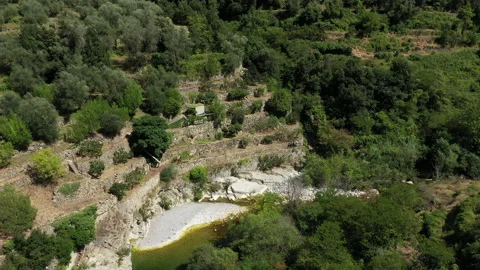 Terrace fields in the rough mountains of Liguria, Italy. Drone shot. Stock Footage 138835427